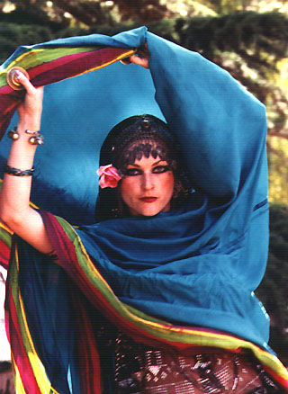 Dancer, Asia, with blue scarf.